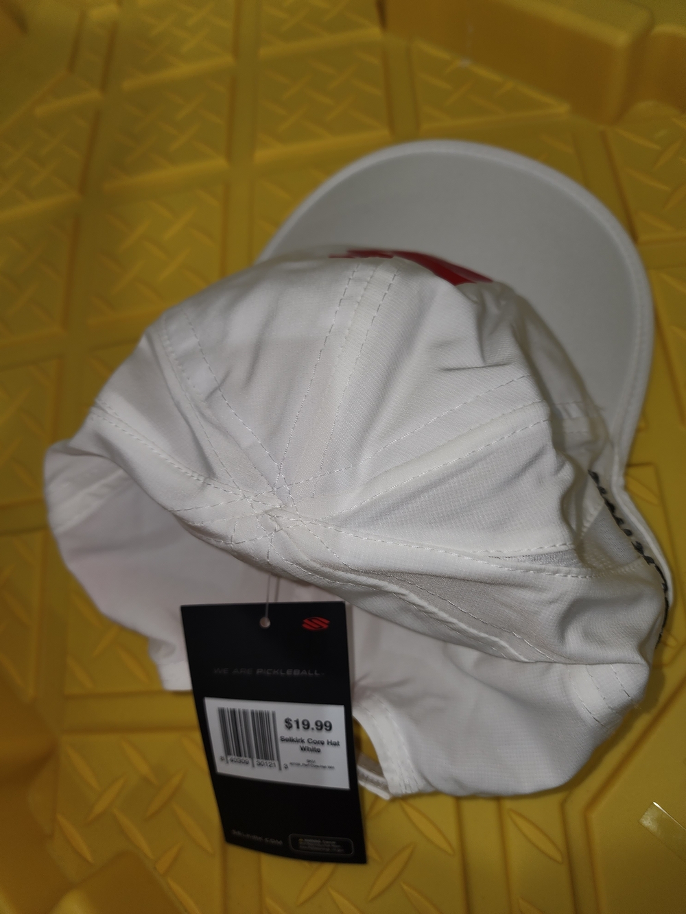 White Men’s Dri Fit Cap with Red Accent